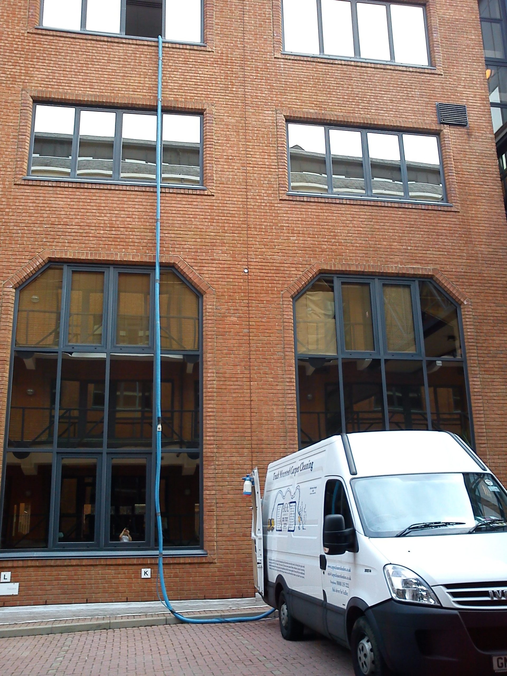 Cleaning carpets using the truck mounted machine to 3rd floor St. Thomas' Hospital